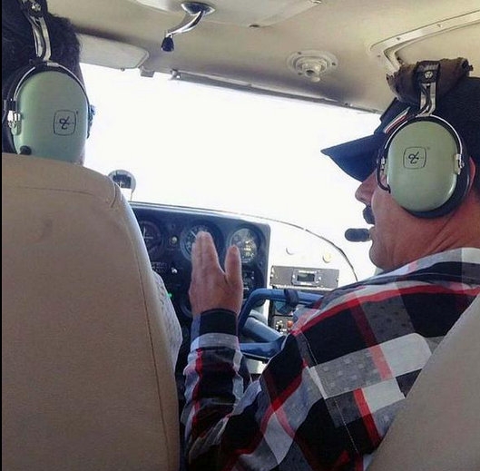 15-07/15/image-twitter-shows-him-flying-helicopter