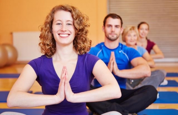15-11/06/bigstock-happy-woman-smiling-in-yoga-cl-39274318