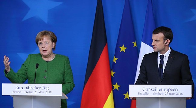 18-03/23/merkel-macron