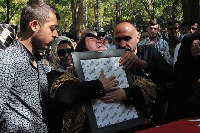 19-10/12/konyali-sehidi-20-bin-kisi-son-yolculuguna-ugurladi_5947_dhaphoto1